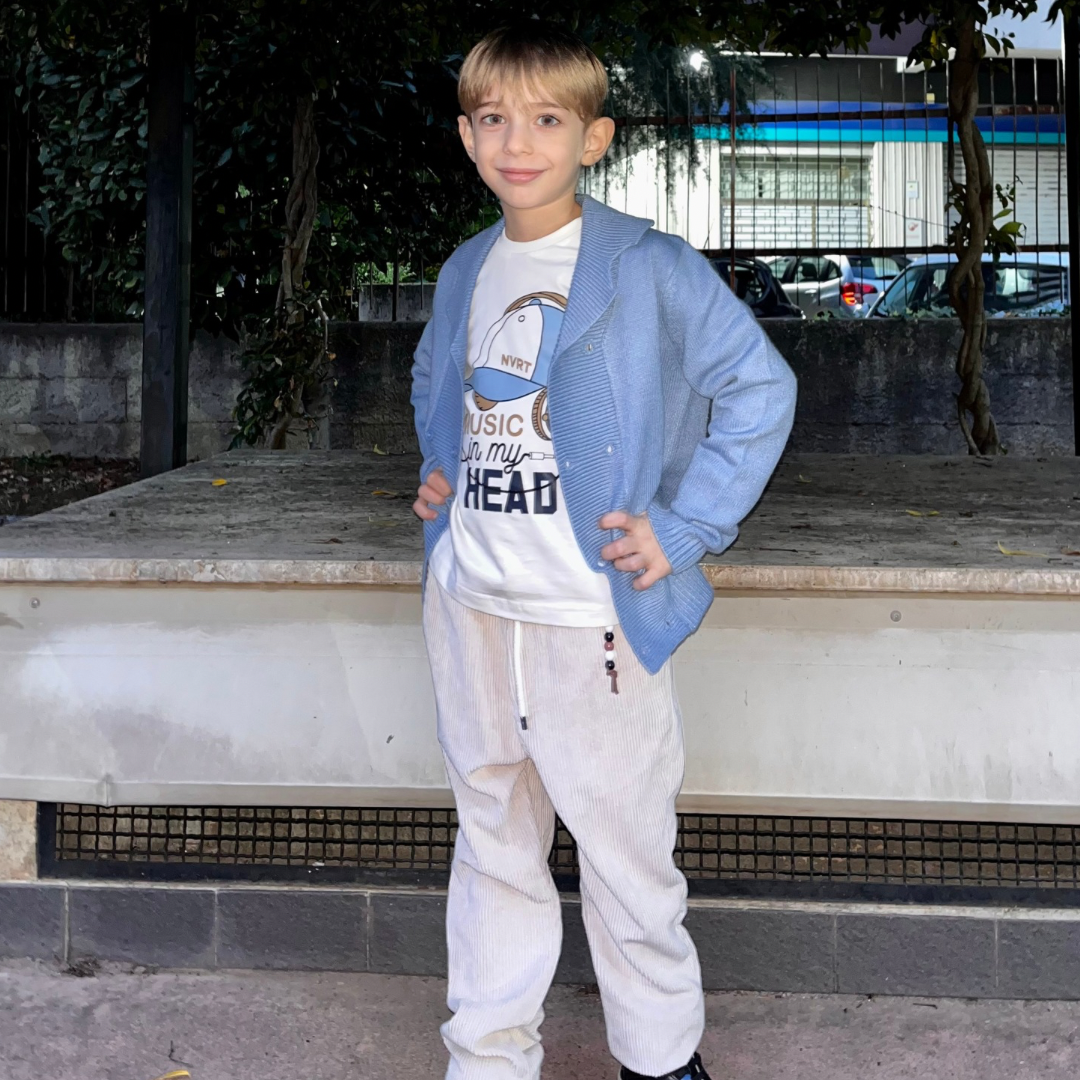 Cardigan azzurro disponibile dalla 9 alla 30 mesi