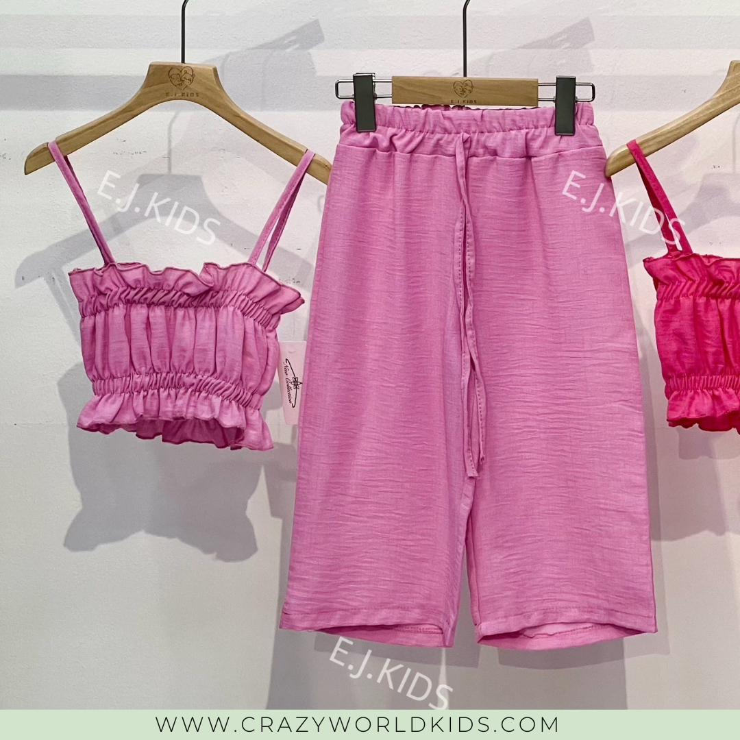 Completo disponibile in fucsia e celeste dalla 4 alla 14 anni