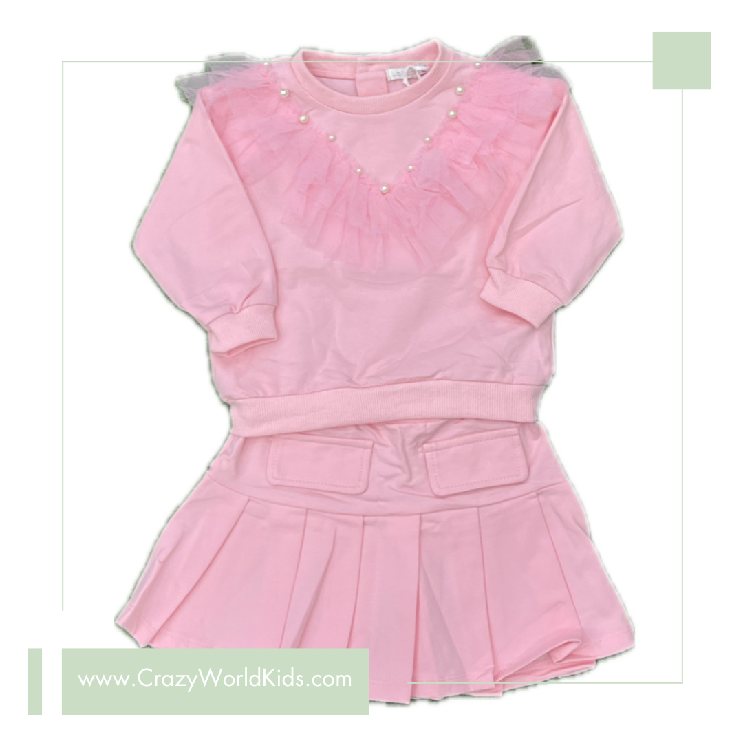 Completo due pezzi con gonna disponibile rosa o azzurro dalla 12 alla 36 mesi
