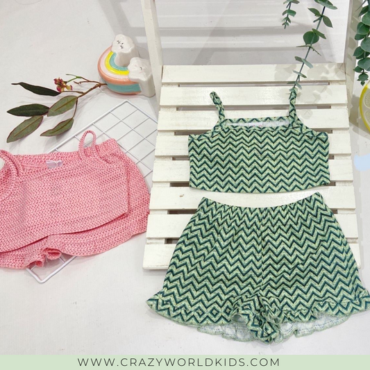 Completino disponibile in verde e rosa dalla 6 alla 24 mesi