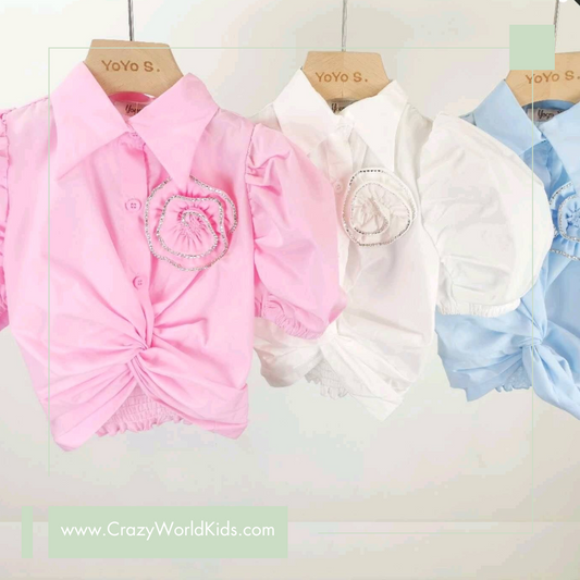 Camicia con fiore disponibile in bianco dalla 4 alla 14 anni