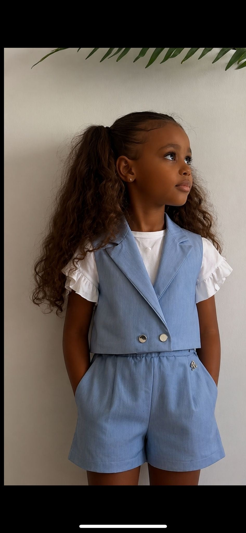 Completo gilet e shorts